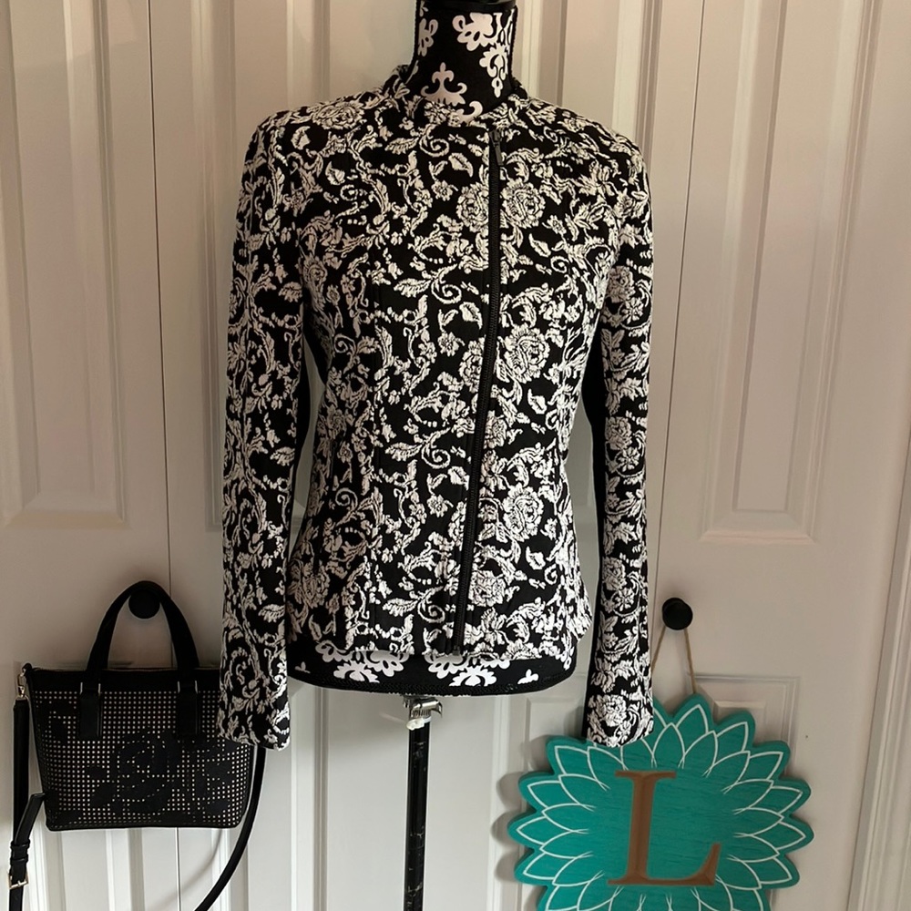 Black & white floral jacket w/ black offset zipper & black back & under arms